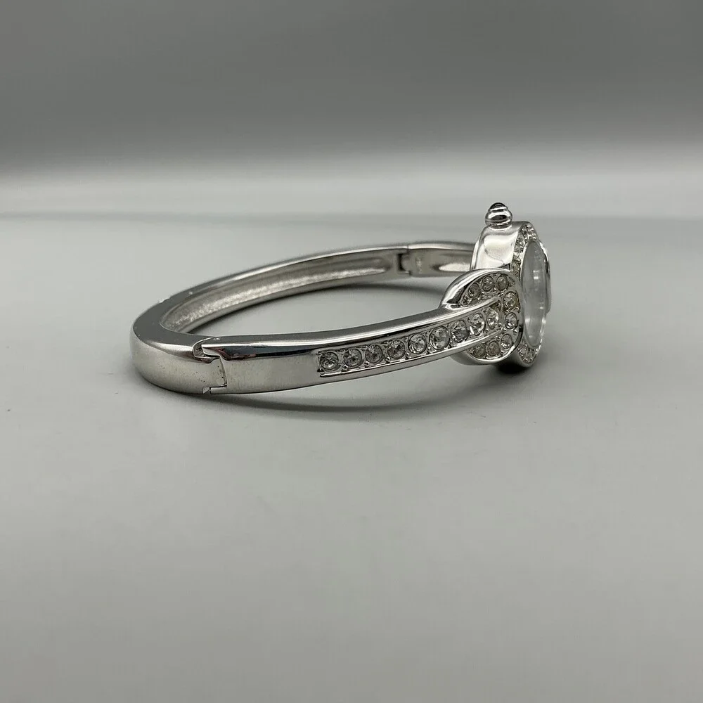 Nolan Miller Womens Watch 21mm Silver Tone MOP Dial Bangle Crystals 7